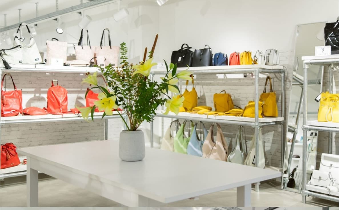 Collection pieces set out on a display table in the showroom